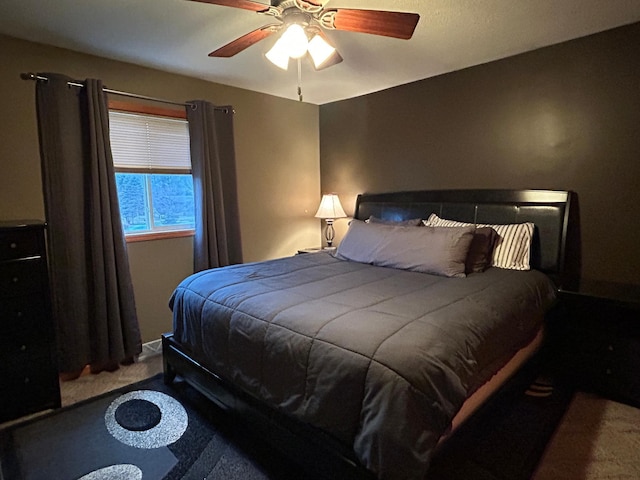 bedroom featuring carpet and ceiling fan