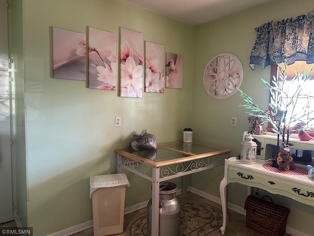 office space featuring a textured ceiling