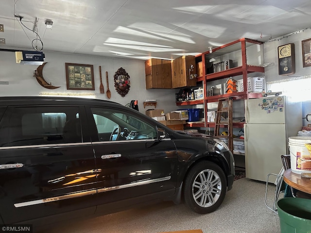 garage featuring freestanding refrigerator