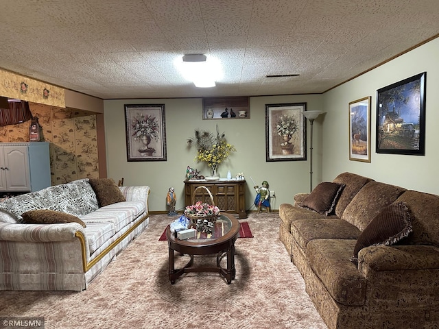 living area with visible vents and carpet