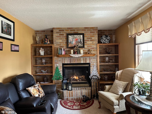 living area featuring a brick fireplace, carpet floors, and a textured ceiling
