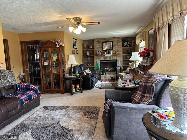 carpeted living room with a ceiling fan, a brick fireplace, and a textured ceiling
