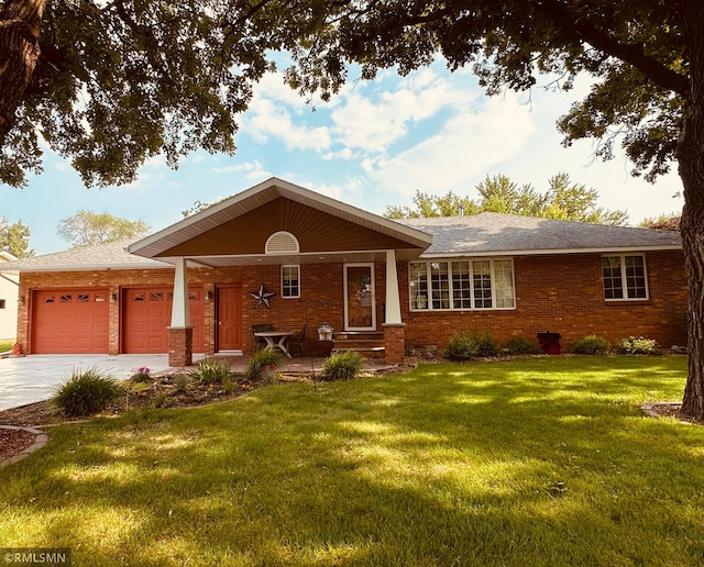 144 3rd St N, Sauk Centre, MN 56378 - ranch-style house with brick siding, driveway, an attached garage, and a front yard