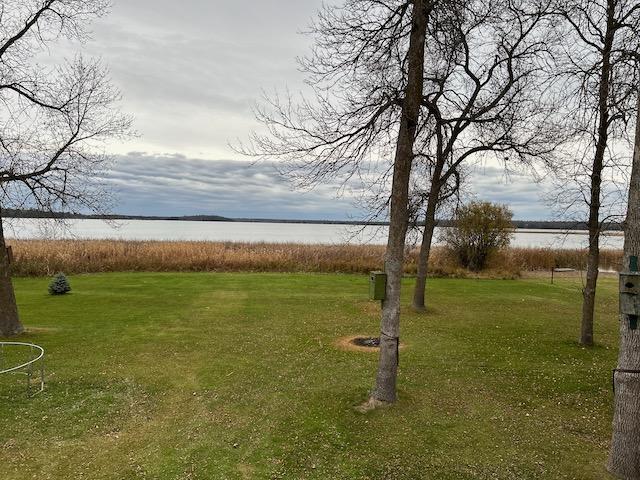 view of yard with a water view