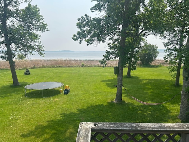 19162 Coho Loop NE, Blackduck, MN 56647 - view of home's community featuring a trampoline, a water view, and a lawn