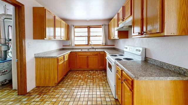 kitchen featuring white range with electric stovetop, light tile patterned floors, and sink