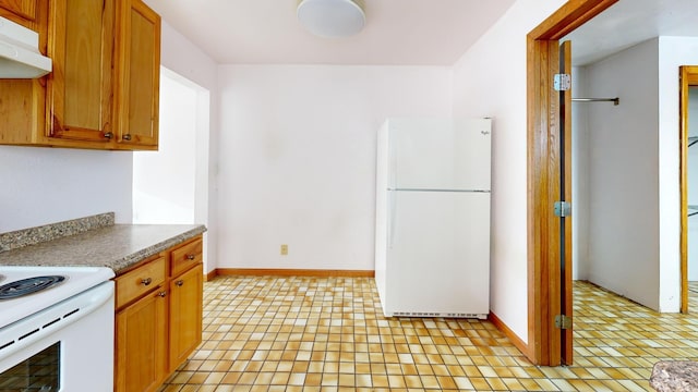 kitchen featuring white appliances