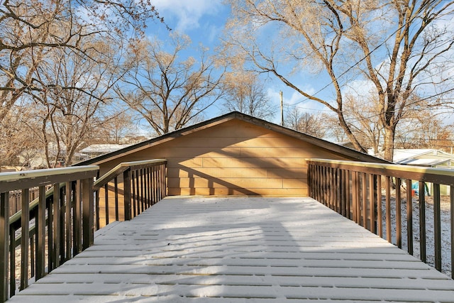 view of snow covered deck