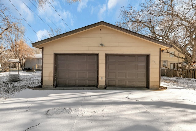 view of snow covered garage