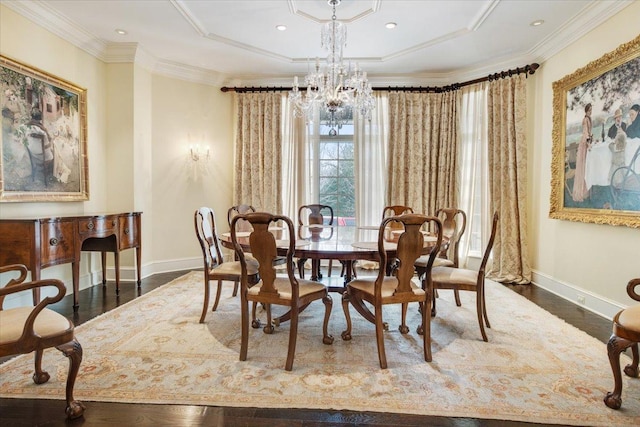 dining space featuring an inviting chandelier, dark hardwood / wood-style floors, and crown molding