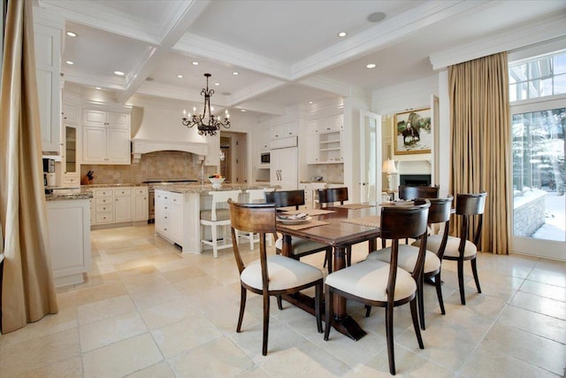 dining area featuring beamed ceiling, crown molding, coffered ceiling, and an inviting chandelier