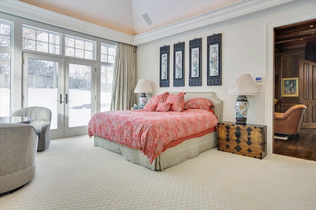 carpeted bedroom with multiple windows, ornamental molding, access to outside, and french doors