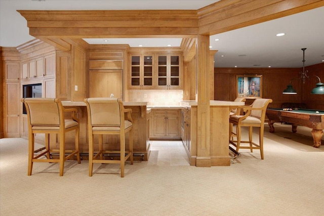 bar with billiards, crown molding, wooden walls, light colored carpet, and decorative backsplash