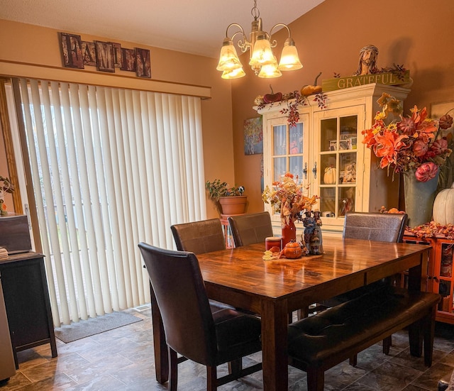 dining room featuring a notable chandelier