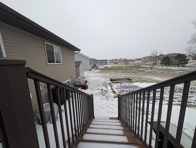 view of snow covered deck