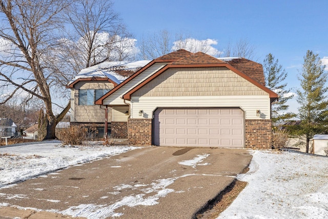 view of front of home with a garage