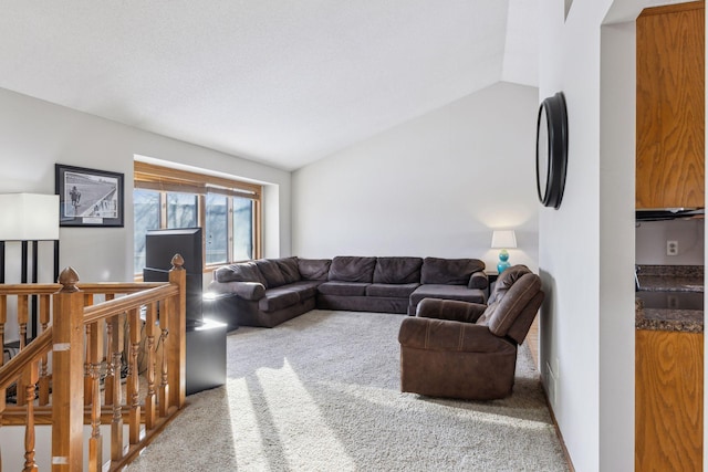 living room with carpet flooring and vaulted ceiling