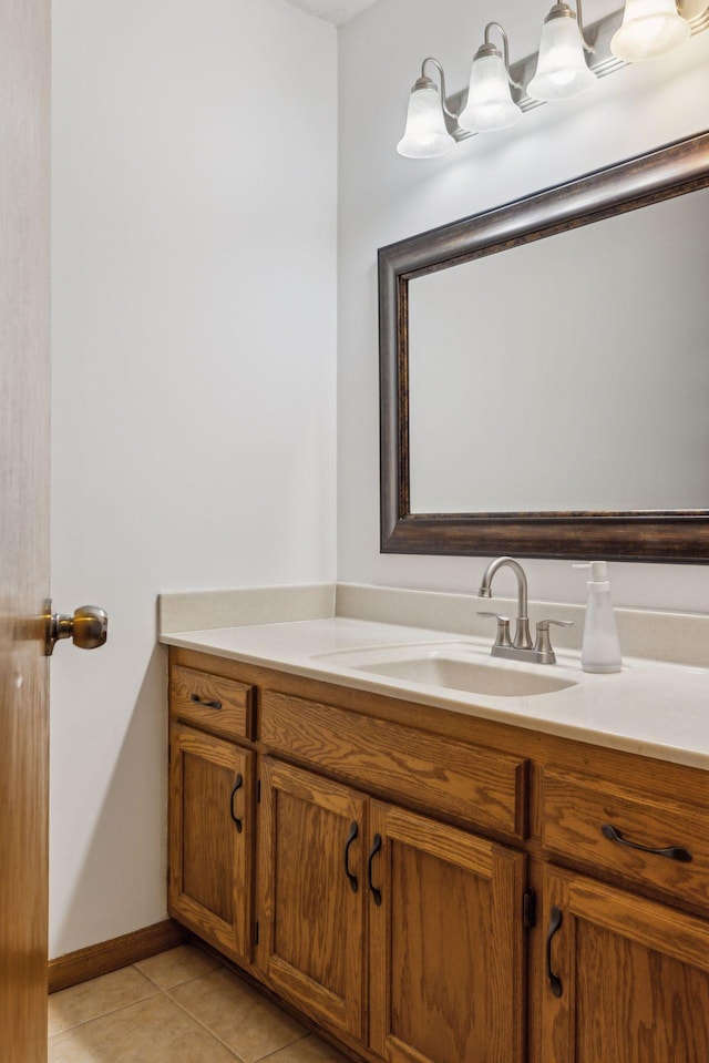 bathroom featuring tile patterned flooring and vanity