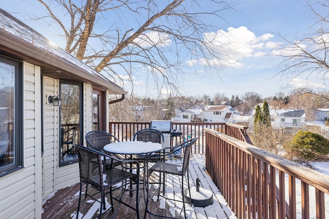 view of snow covered deck