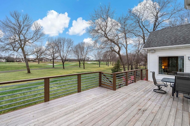 deck featuring a yard