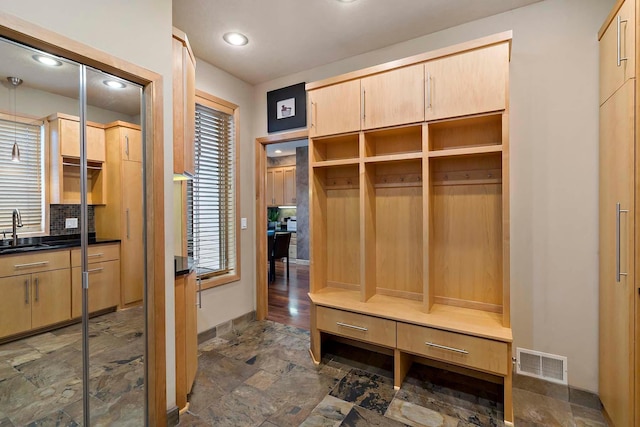 mudroom featuring sink