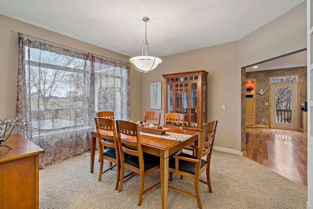 dining room with light hardwood / wood-style floors