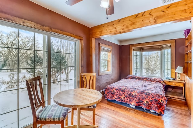 bedroom with light wood-type flooring and ceiling fan