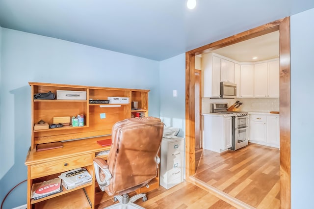 home office featuring light wood-type flooring