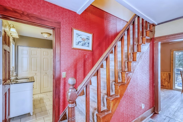 stairs featuring sink