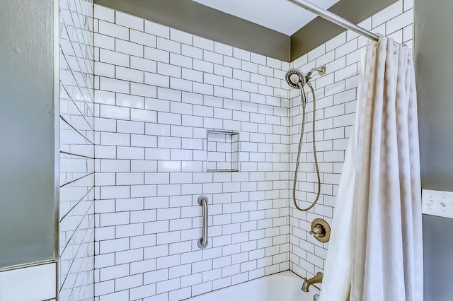 bathroom with shower / bathtub combination with curtain