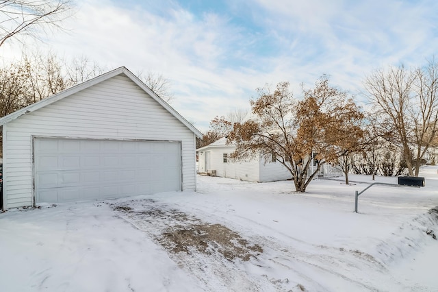 view of snow covered garage