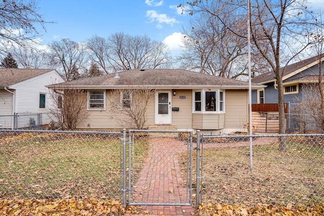 ranch-style home featuring a front lawn