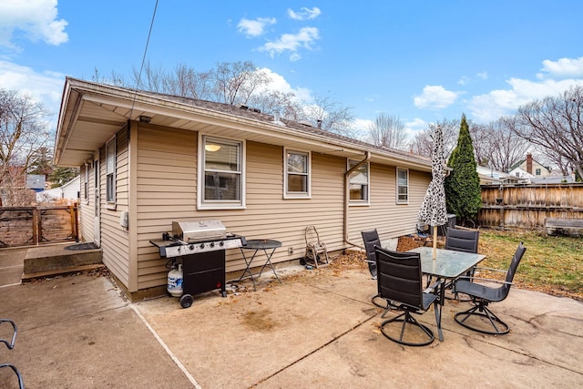 back of property with a patio area