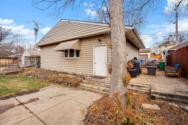 back of house featuring a patio