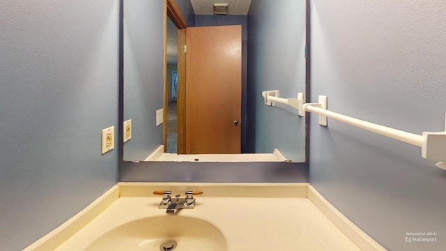 bathroom featuring sink