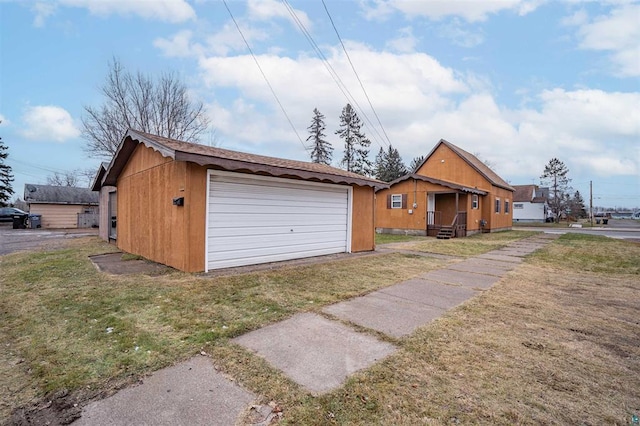 garage with a yard