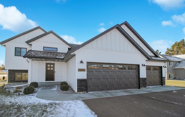 modern farmhouse style home with a garage