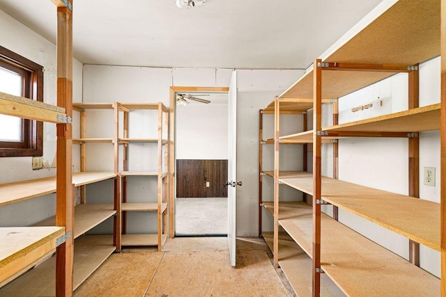 storage area featuring ceiling fan