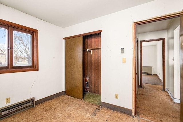 unfurnished bedroom with a closet