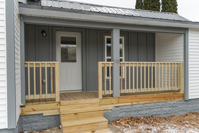 entrance to property with a porch