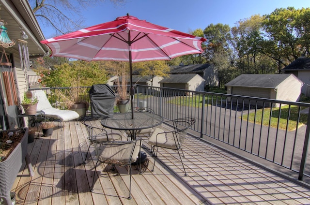 deck featuring an outbuilding