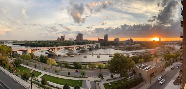 aerial view at dusk with a water view