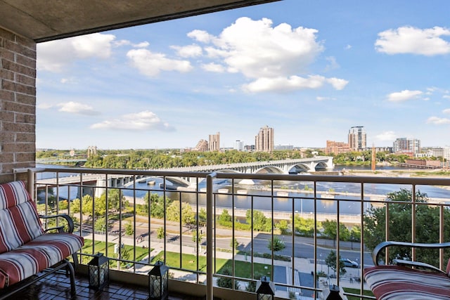 balcony featuring a water view