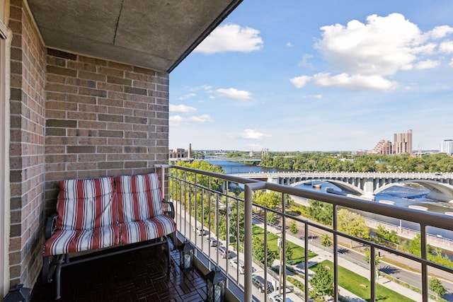 balcony featuring a water view