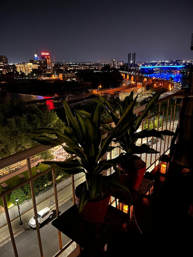 view of balcony at twilight