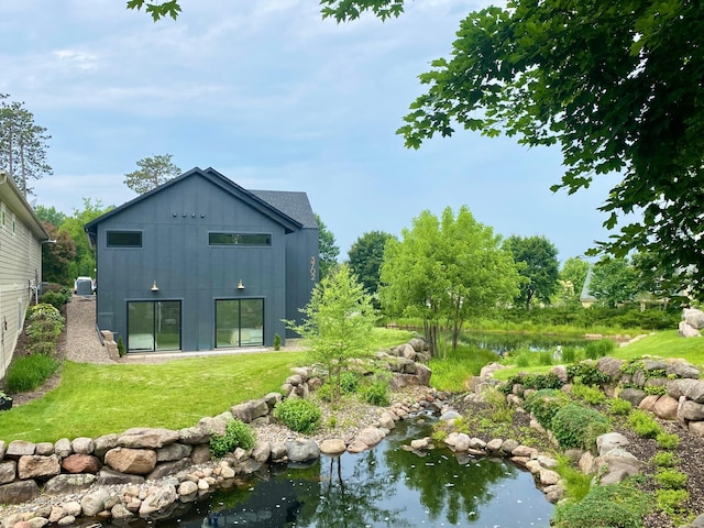 3702 Planting Grn, Stillwater, MN 55082 - back of property featuring board and batten siding and a lawn