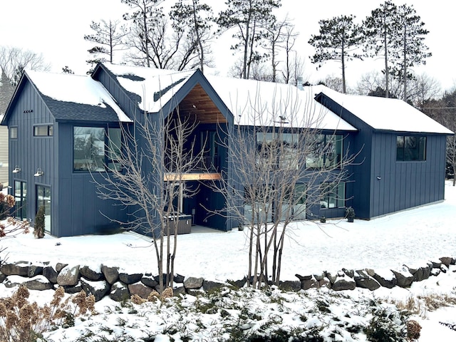 3702 Planting Grn, Stillwater, MN 55082 - view of snowy exterior with board and batten siding