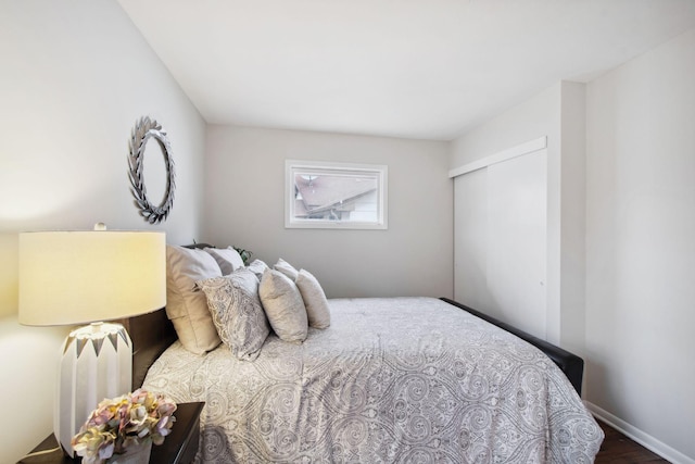 bedroom featuring a closet and hardwood / wood-style floors