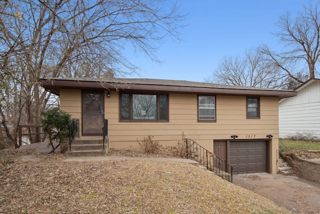 view of front of property featuring a garage