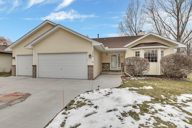 ranch-style house featuring a garage